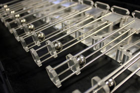 Photo of a row of ball and beams